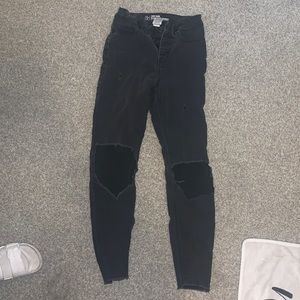 black ripped jeans